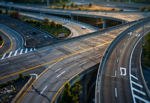 Slices joint sealant from control joints in highway repairs.