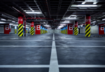 Slices joint sealant from control joints in parking garages.