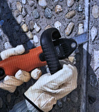 Oscillating blade removing joint sealant (2).