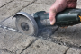 Stelli-Cutter:  Slicing joint sealant.