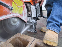 14" Gas Dust Guard attached to Stihl Saw.