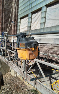 Dewalt 'compact' vac - secured on scaffold.