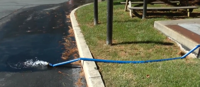 Discharge of water water using included fire hose.
